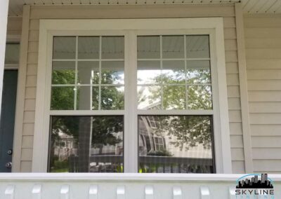 exterior view of house windows with reflective mirror tint installed 3M Affinity 15