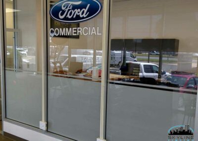 ford vinyl printed logo on office glass with white privacy decorative film installed