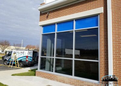 blue colored vinyl film on commercial building windows