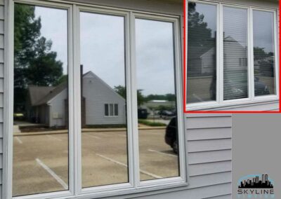 before and after comparison of silver mirror window film installed at an office