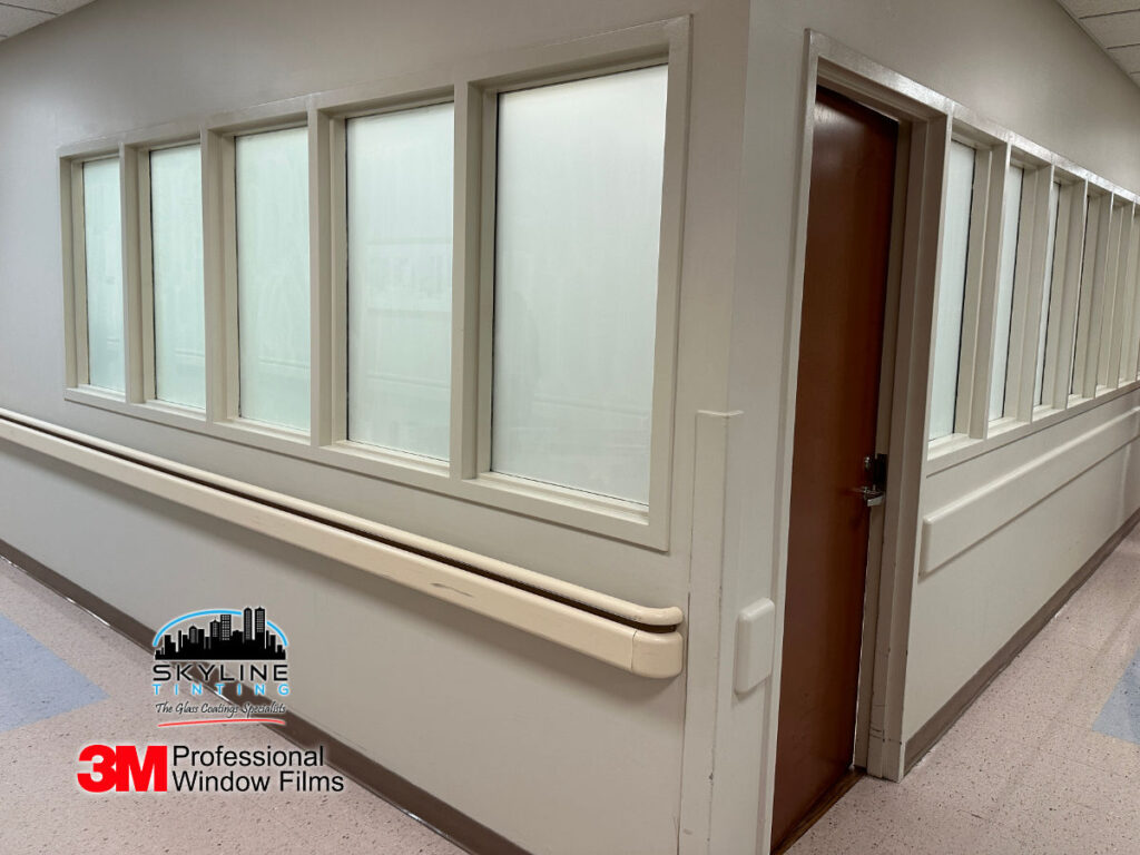 hospital interior windows for waiting room with white frosted privacy film installed