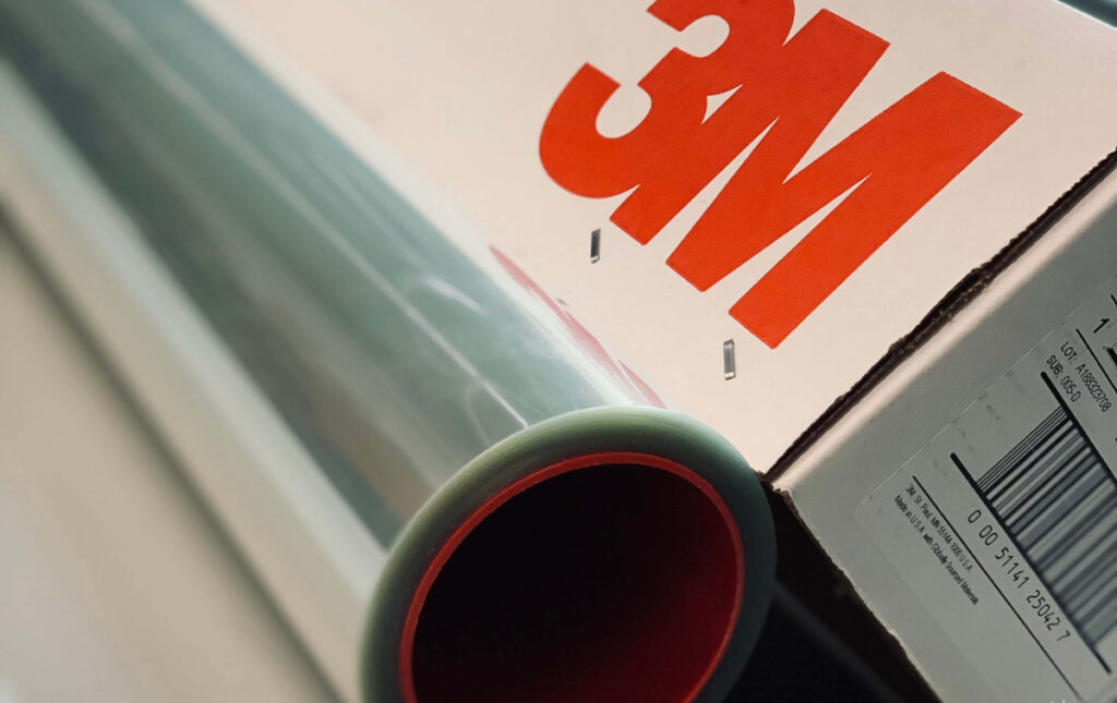 closeup picture of a roll of clear safety window film