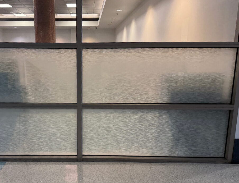 post-121825 • Skyline Tinting LLC exterior view of decorative glass film installed on office partition wall
